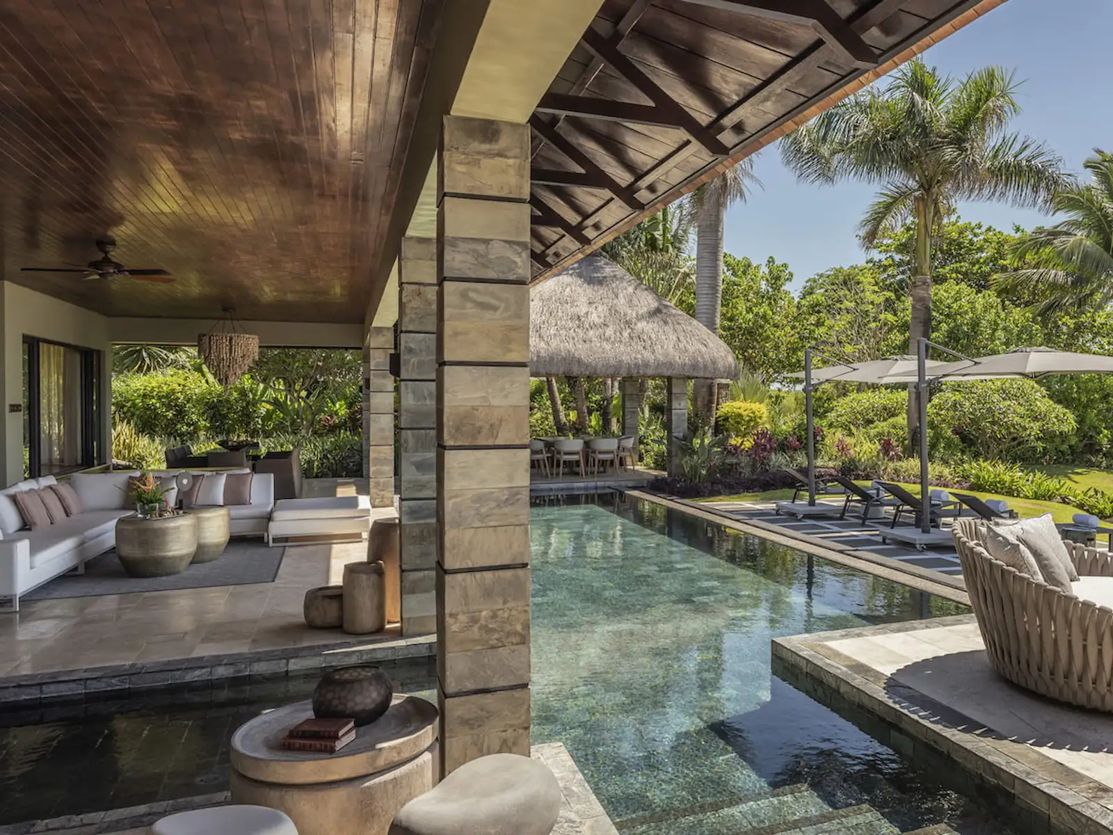 5%20Bedroom%20Premium%20Oceanfront%20Private%20Retreat-3 Explore the Best Ocean View Mauritius’s Villas for Holidays with Private PoolsThis holiday rentals Mauritius vast living and dining spaces is decorated with modern furniture and contemporary art.