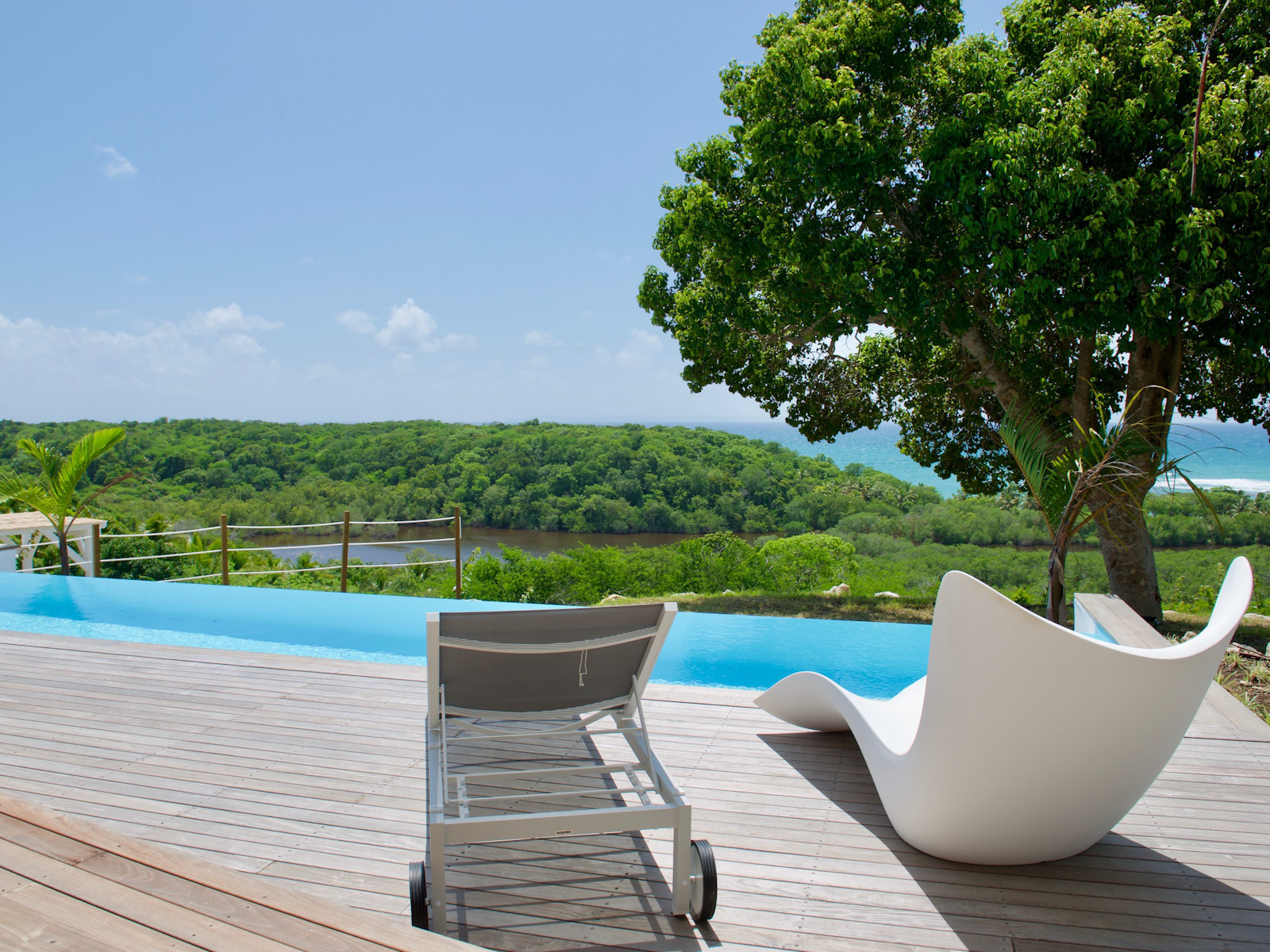 Villa%20Acajou%20Blanc-17 Top 10 Luxury Villas in Guadeloupe for an Unforgettable Island EscapeDiscover the top 10 luxury villas in Guadeloupe for a truly unforgettable island escape. Enjoy breathtaking views, private pools, and ultimate comfort with us.